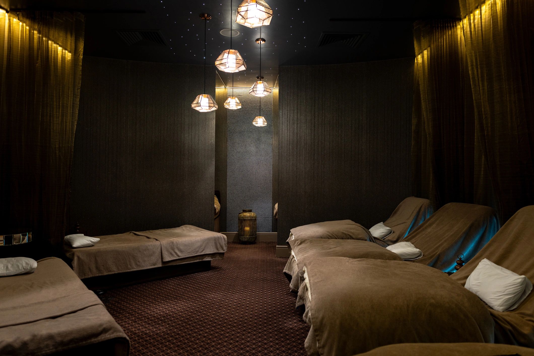 Quiet onboard spa relaxation area with heated loungers